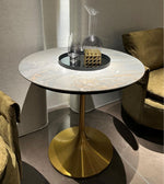 Marble pedestal dining table with sleek design, showcasing a round marble top and sturdy base, ideal for modern dining rooms.