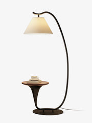 Arc floor lamp with side table isolated on white background