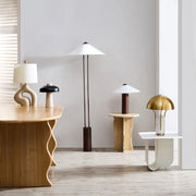 Contemporary designer floor lamp styled in modern interior setting
