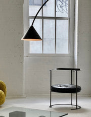 Modern curved floor lamp with glass spheres isolated on white background