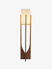 Wooden floor lamp with fabric shade isolated on white background
