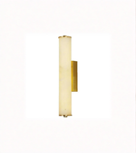 Wall-mounted light fixture with gold finish and white shade on a white background