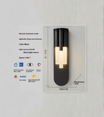 Black wall light fixture with specifications on a gray background