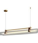 Modern pendant light with gold accents on a white background