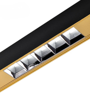 Decorative strip with metallic pyramid designs on a white background