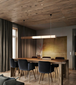 Modern dining room with wooden table and chairs, large window, and pendant light.