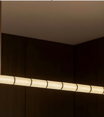 Ceiling light fixture with a warm glow in a dark room
