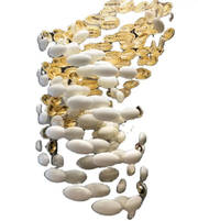 Necklace with white and gold beads on a white background