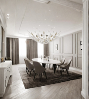 Modern dining room with a chandelier, table, and chairs.