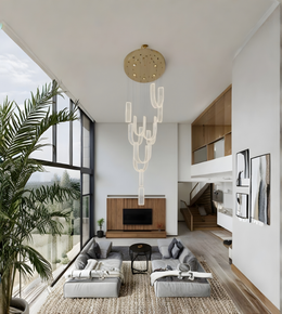 Modern living room with a chandelier, gray sofa, and large windows.