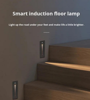 Smart induction floor lamp installed on a staircase with text indicating its function.