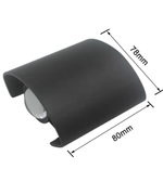 Black cylindrical object with dimensions labeled on a white background