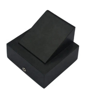 Black rectangular box with a lid on a white background