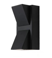 Black geometric vase on a white background