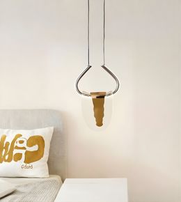 Modern pendant light fixture in a room with a neutral color scheme.