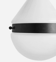 Close-up of a modern pendant light with white glass shade and black band on a white background