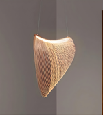 Modern pendant light with a geometric design on a plain background