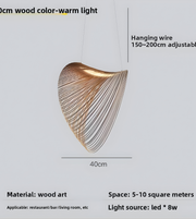 Wooden pendant light with adjustable hanging wire on a gray background