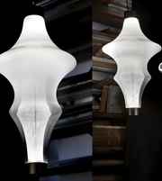 Modern pendant light fixture shown in two different settings.