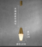 Gold pendant light with measurements on a gray background
