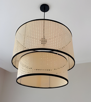 Ceiling light fixture with woven design on a neutral background