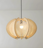 Modern pendant light with a textured design on a plain background