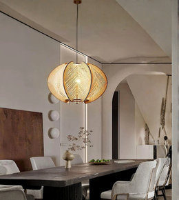 Woven petal pendant light in dining room setting