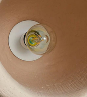 Light bulb inside a ceiling fixture