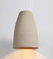 Textured beige pendant light against a plain background