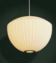 Spherical pendant light with ribbed design on a dark background