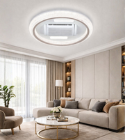 Round ceiling-mounted LED light with integrated ventilation fan in a modern living room