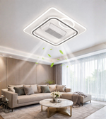 Square designer LED ceiling light with integrated ventilation fan in a modern living room interior