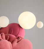 Close-up of glowing orb light detail on cartoon mouse lamp