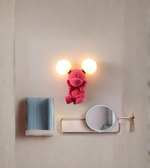 Wall-mounted pink cartoon mouse lamp in modern interior setting