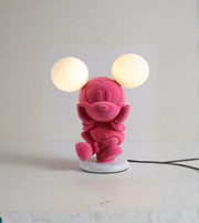 Cartoon-inspired pink mouse lamp front view with glowing orb lights