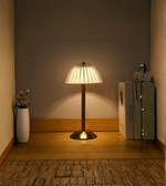 Elegant gold table lamp with ribbed glass diffuser