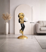 Luxury astronaut floor lamp holding glowing orb with moon base for modern interior décor