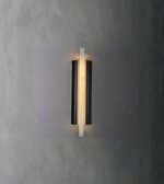 Contemporary linear wall light emitting warm ambient glow on textured wall
