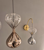 Contemporary wall lamp with smoked and chrome glass finish