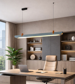 Modern linear pendant light hanging above office desk providing uniform lighting in contemporary workspace