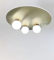 Ceiling light fixture with three round lights on a plain background