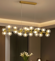 Modern chandelier with glass bulbs in a room setting