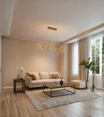 Modern living room with beige sofa, coffee table, and decorative elements.