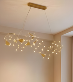 Modern chandelier with string lights hanging from the ceiling