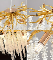 Gold and crystal chandelier with close-up details on a gray background