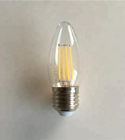 Clear LED light bulb on a plain background