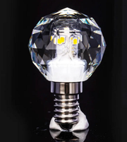 Crystal LED light bulb on a black background
