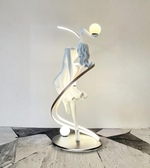 Modern floor lamp with artistic design on a light gray background