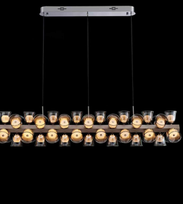 Modern pendant light fixture with glass shades on a black background