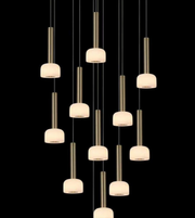Chandelier with multiple pendant lights on a black background